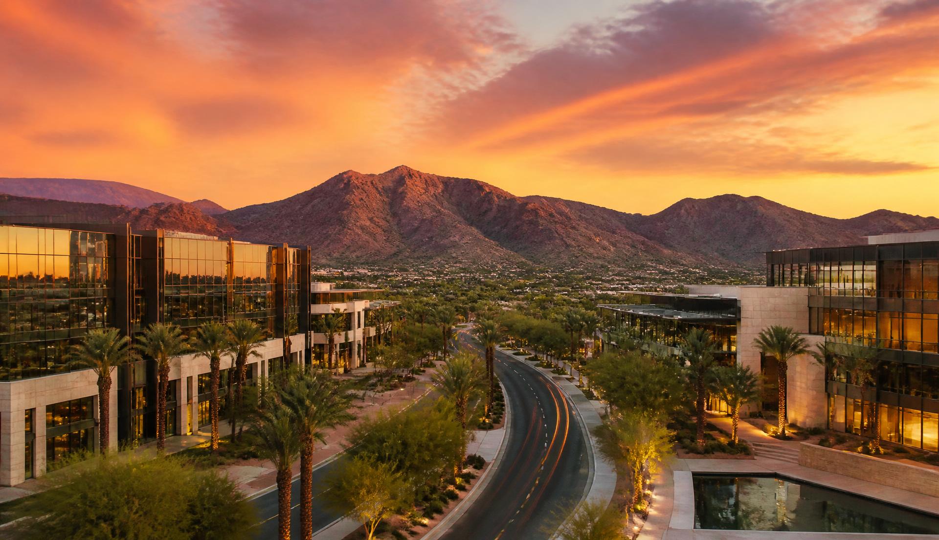 Scottsdale business district at sunset with the McDowell Mountains